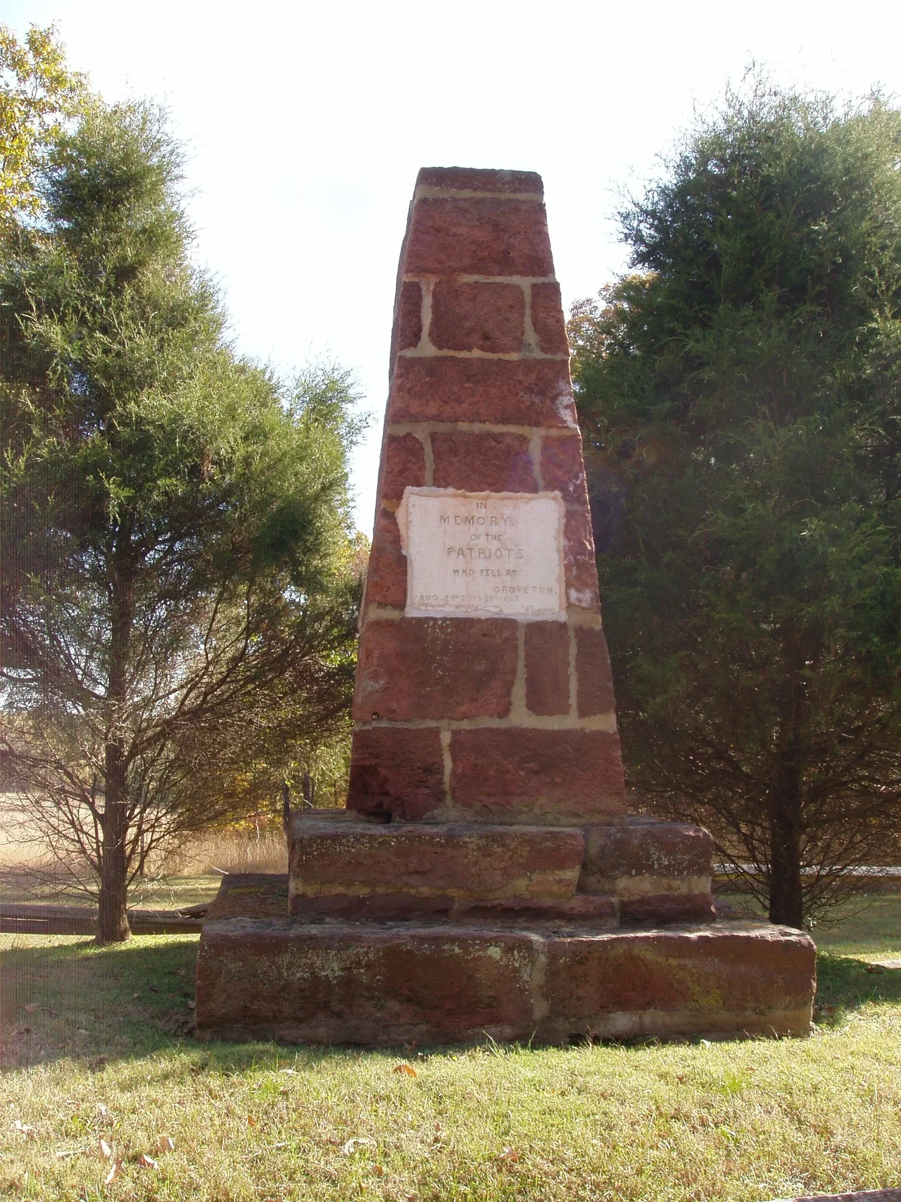 Groveton or Deep Cut monument dedicated in1865 in the open Manassas park landscape, NPS archive