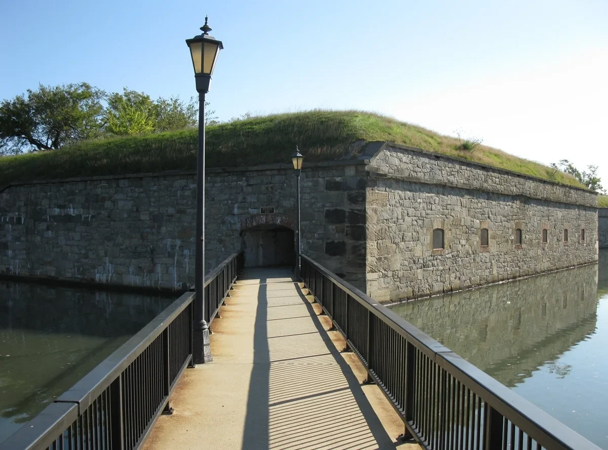 Wooden footbridge over the moat toward Fort Monroe, NPS archive