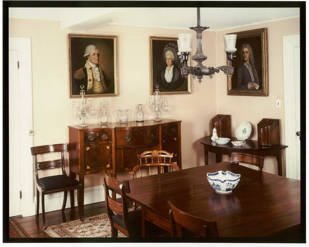 Archival table and furniture in the historic Old House dining room in Quincy