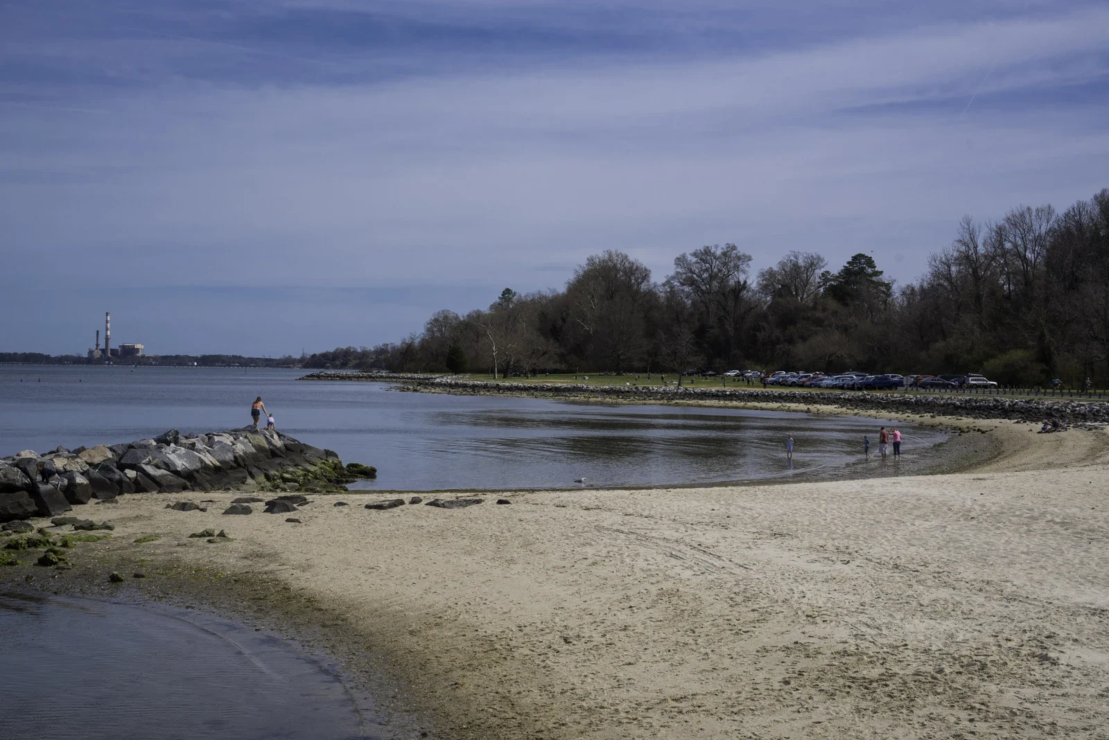 Sandy beach, rock breakwater and York River shoreline at Yorktown