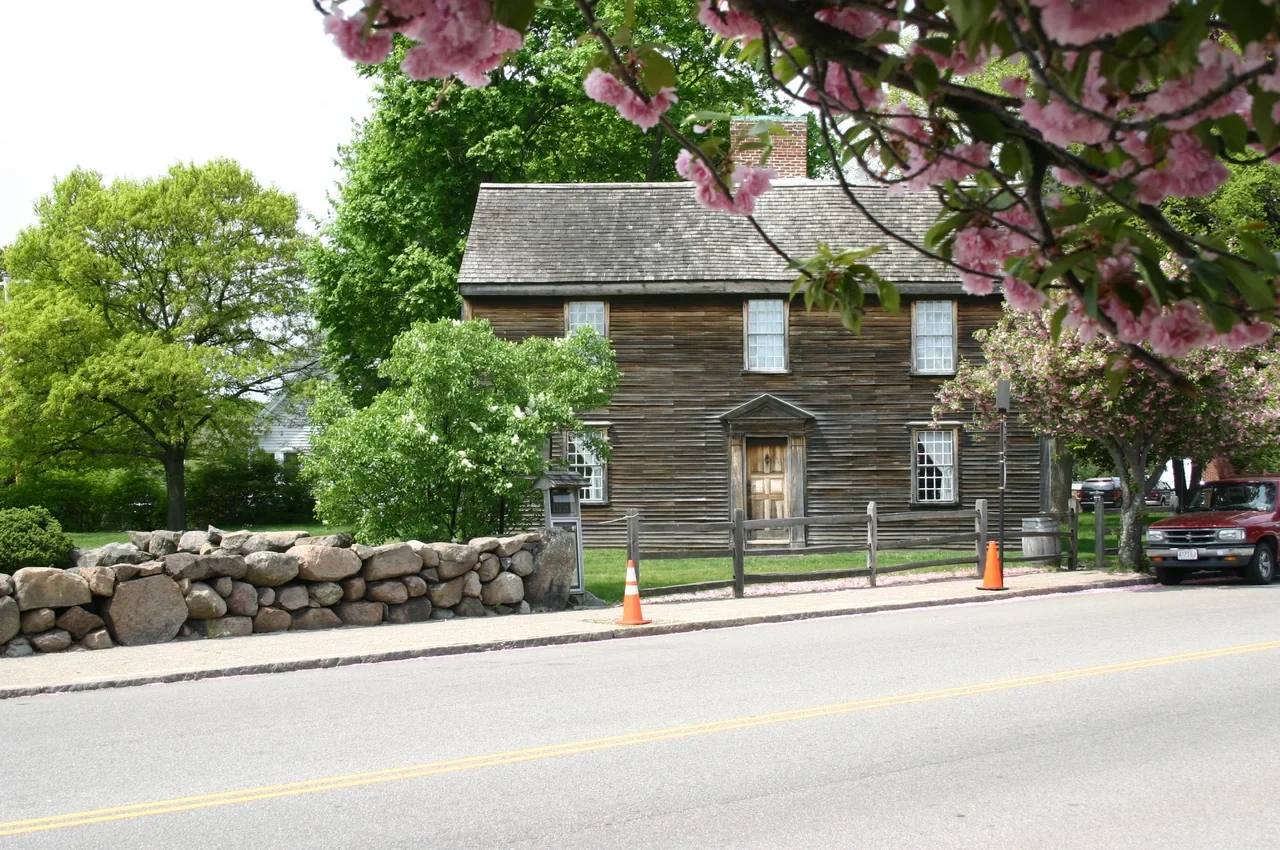 Archival facade of John Adams birthplace from across the street; closed for the remainder of the2026season
