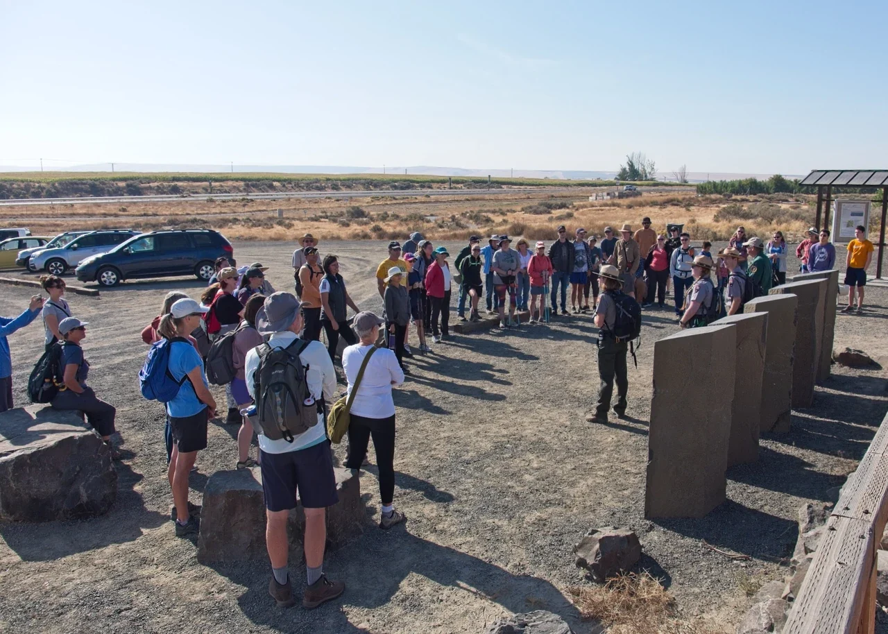 Group and interpretation panels during a Richland hiking programme