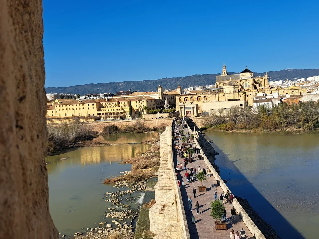 Roman Bridge and Mosque-Cathedral in Córdoba seen from the Calahorra Tower, January 2023
