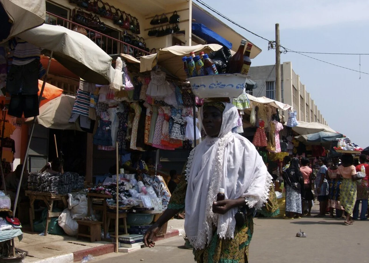 Street and textile shops at Lomé Grand Market; twohundred 2010, 16 January 2010
