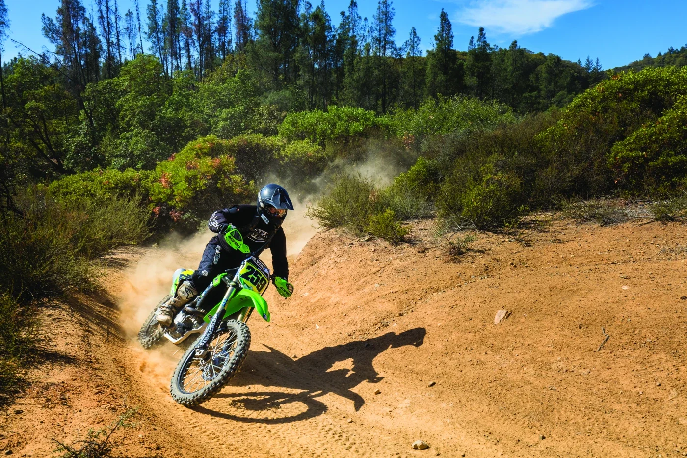 An archive motorcycle rider on a Cow Mountain dirt bend; not permission for OHV use in North Cow Mountain