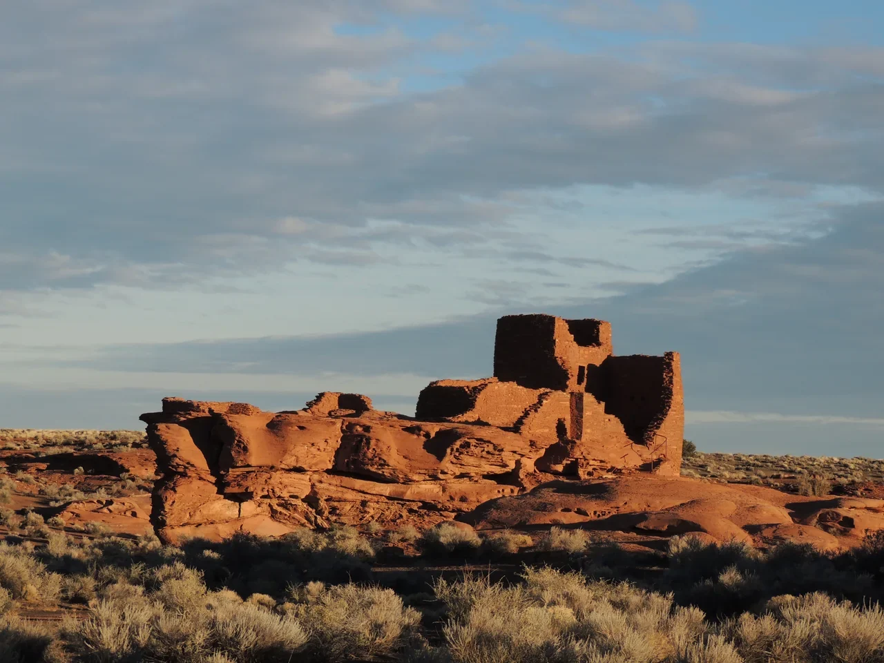 Archival tall sandstone Wukoki Pueblo structure in Wupatki National Monument outside Flagstaff