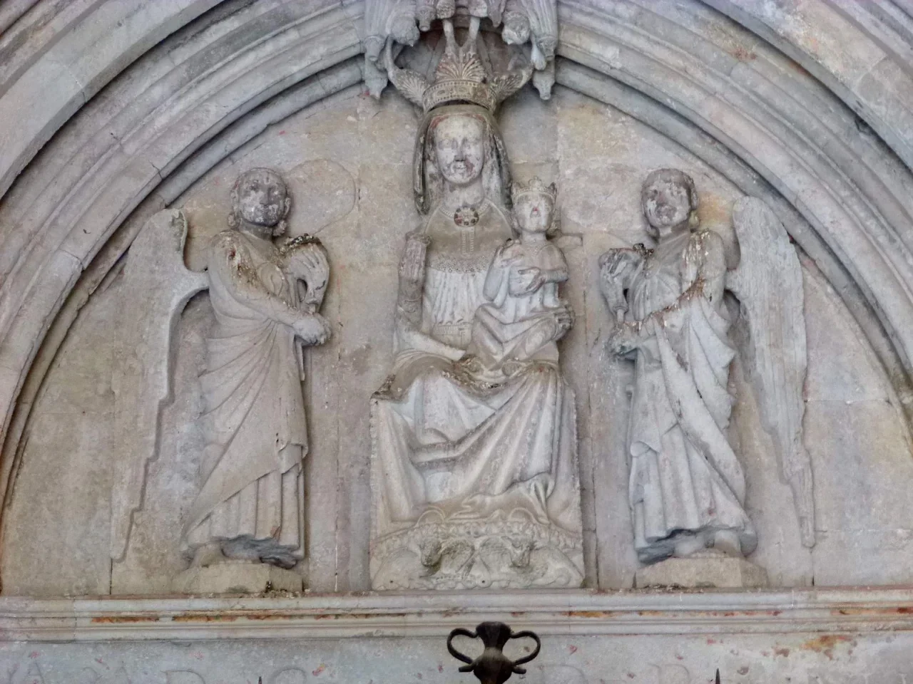 Historic stone relief detail in Girona Cathedral cloister, 2014