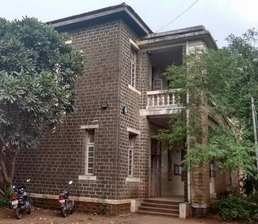 Stone building corner, balcony and entrance steps at Chintamanrao college in Sangli