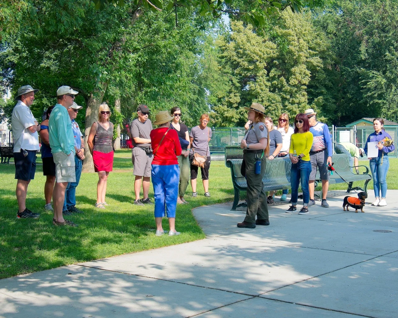 Separate ranger walking-tour scene on a Richland park path, NPS archive