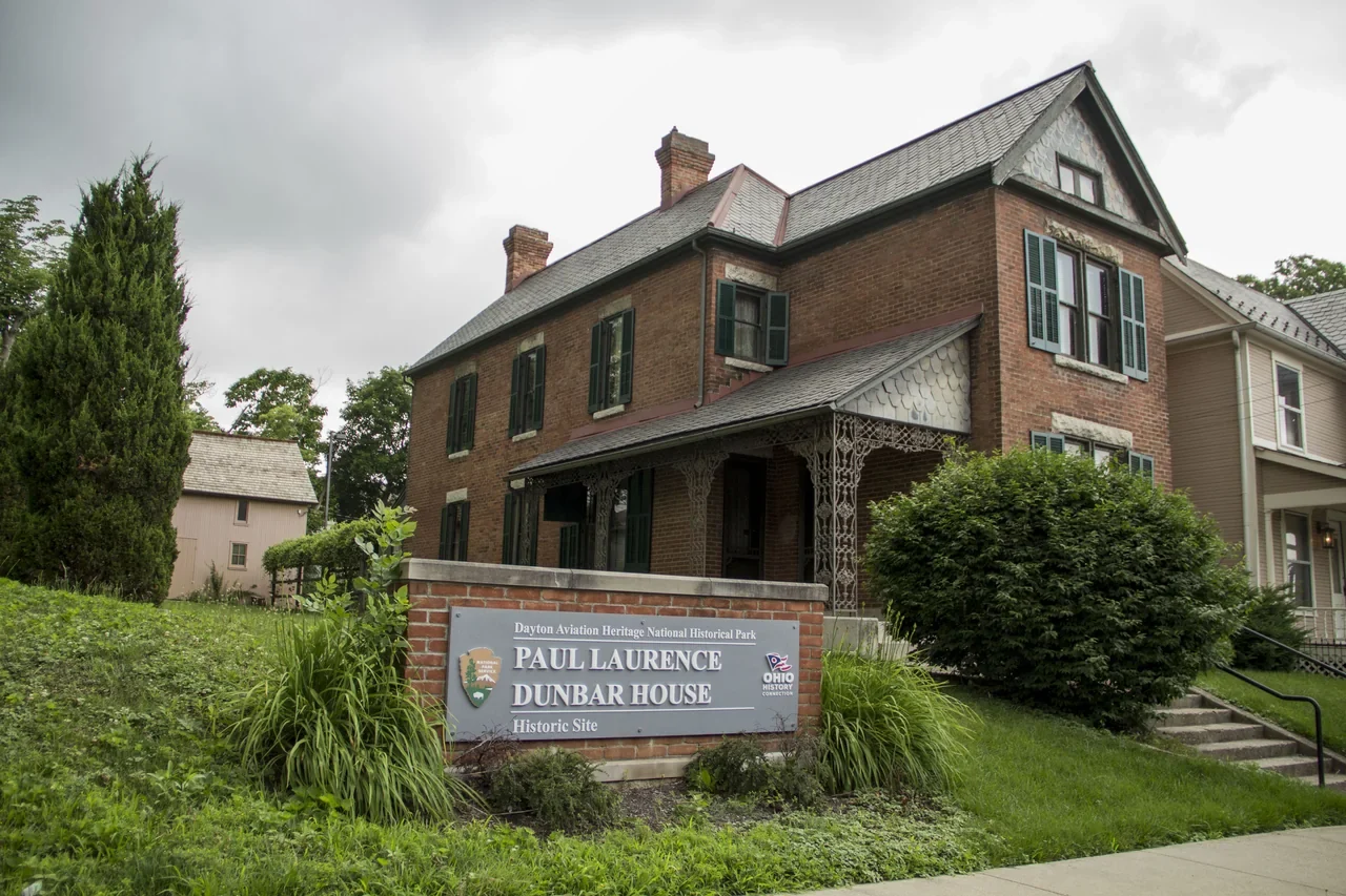 Archival view of Paul Laurence Dunbar House facade and public sidewalk in Dayton