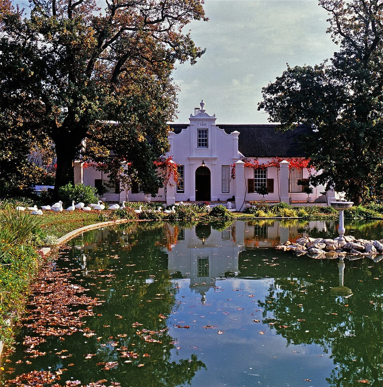 Historic L'Ormarins house and pool view,1988; not a current museum hall or guest room