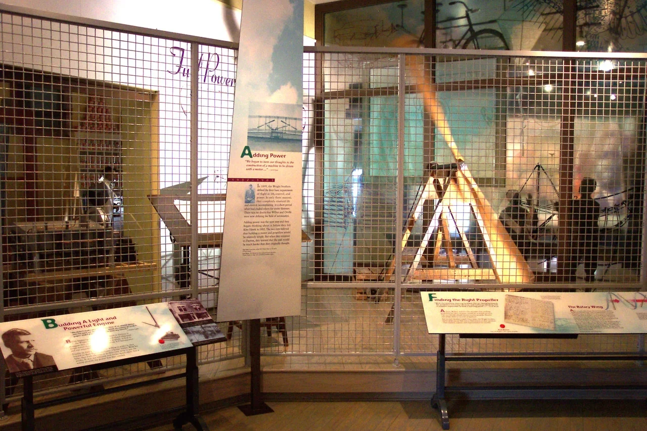 Archival general exhibit view of engine and propeller models at Wright-Dunbar center