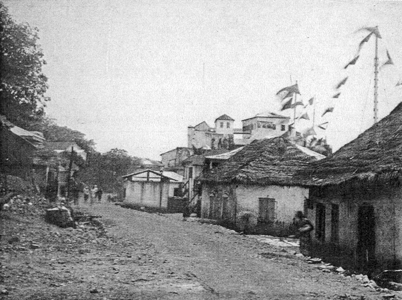 Archive photograph of an Osu street, 1885–1914; photographer unknown, not the present-day city