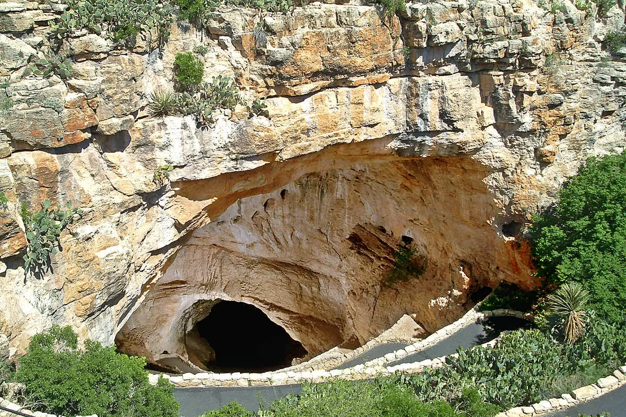 Archival switchback trail descending into the cavern natural entrance at the national park outside Carlsbad New Mexico