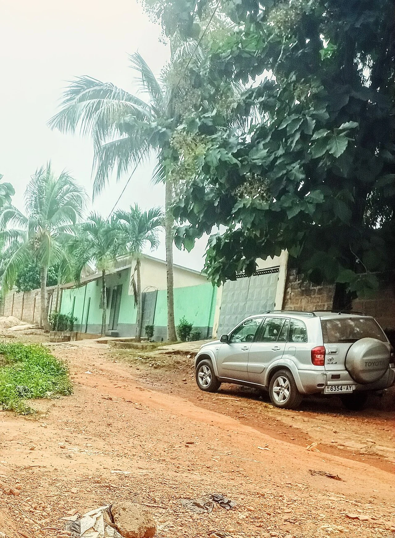 Rural road and settlement surroundings near Kpalimé; Superwide-34, 26 August 2025