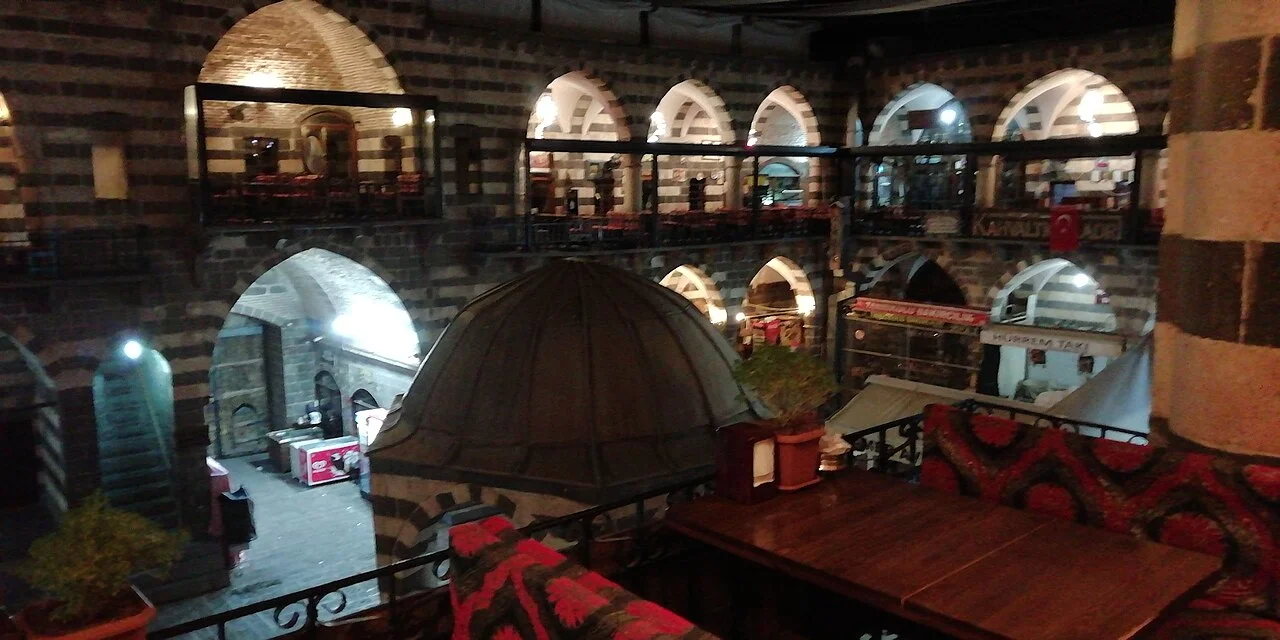 Stone courtyard of Hasan Pasha Han in Diyarbakır at night, August 2020; city context, not a current breakfast-business directory.