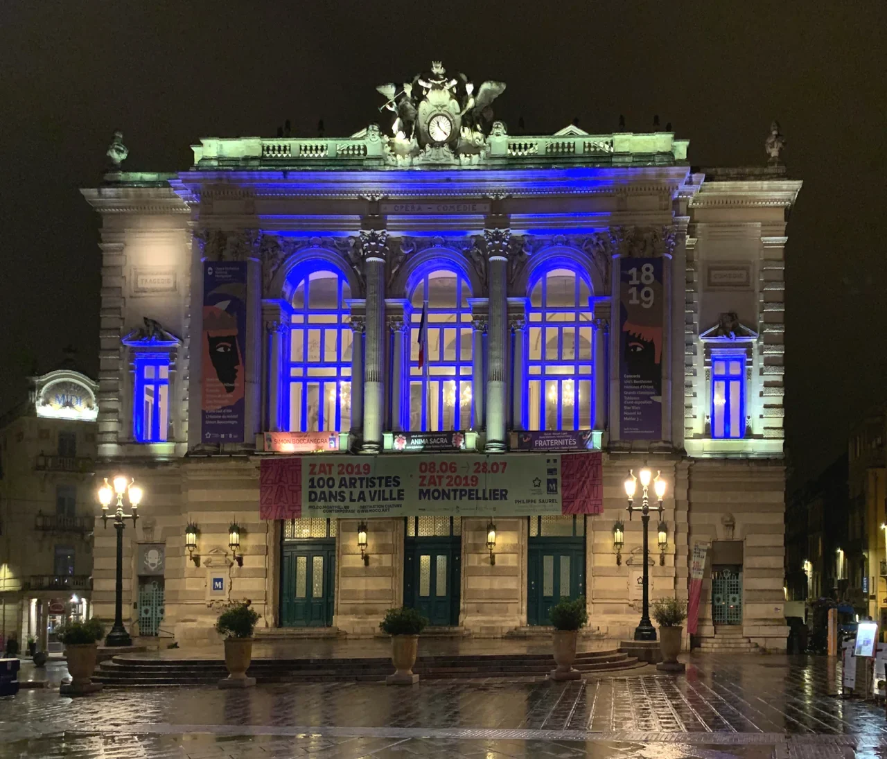 Illuminated facade of Opéra Comédie in Montpellier at night, June 2019