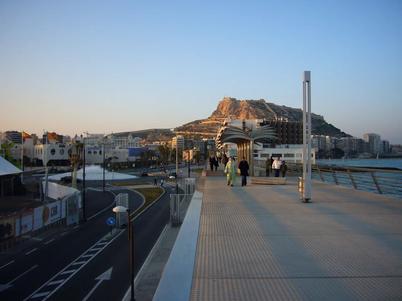 Walkway in Alicante harbour with Santa Barbara Castle behind, archival view from 2009