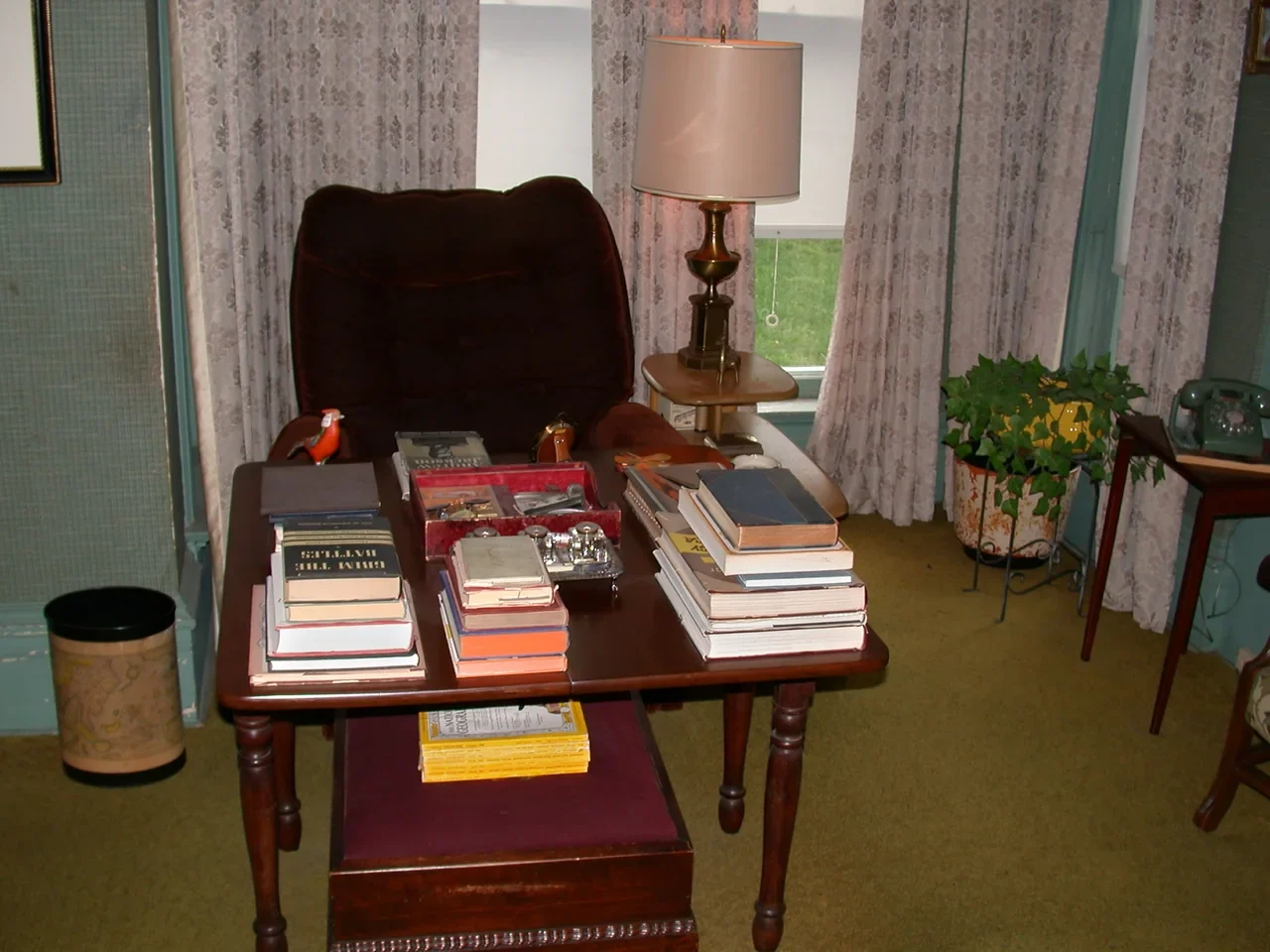 Archival interior of Truman Home study with bookshelves and furniture