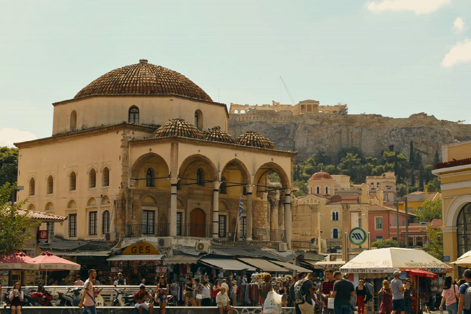 Historic buildings and city life at Monastiraki Square in Athens
