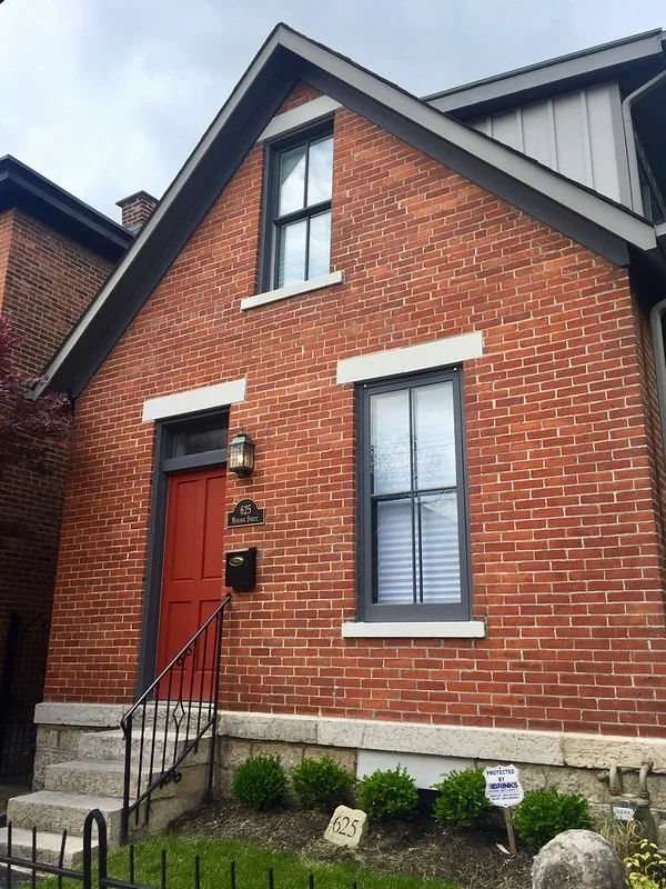 Facade of a small brick house on Mohawk Street in Columbus German Village