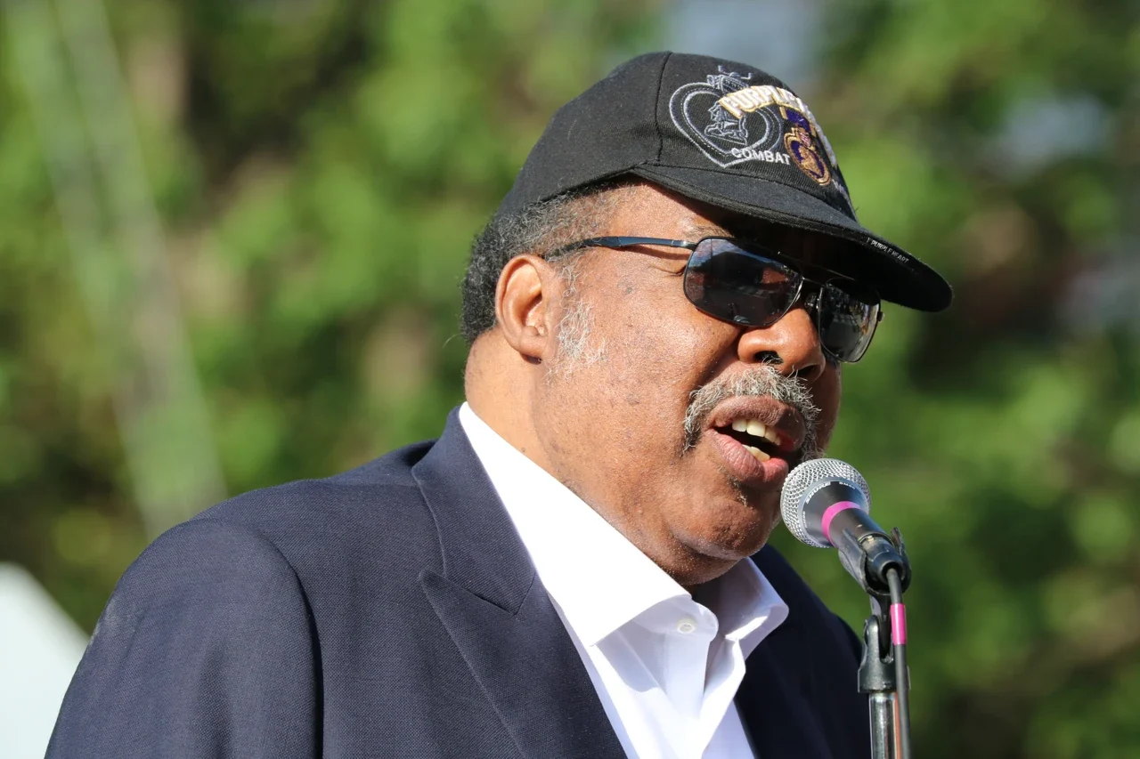 Freedom Rider Hank Thomas speaking at a microphone in the NPS archive