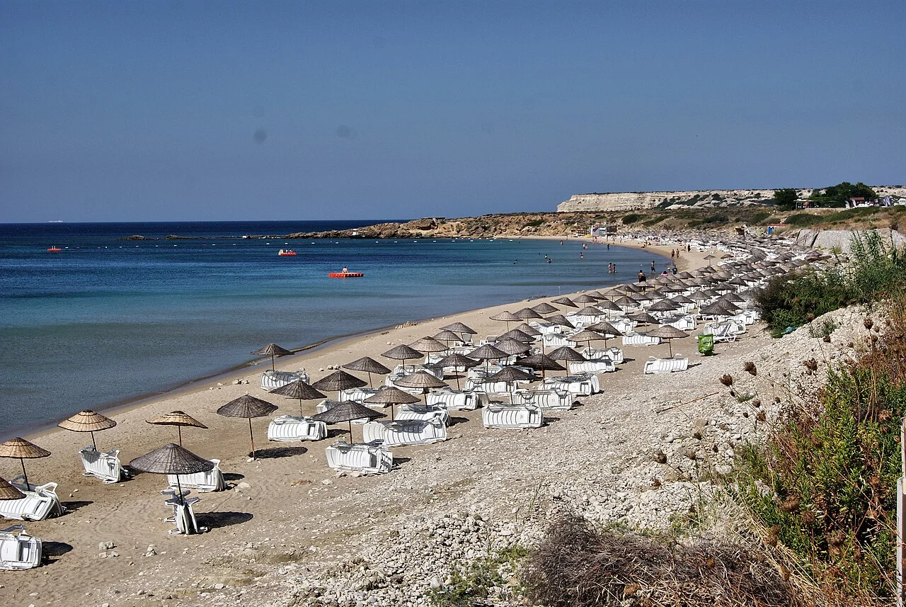 Shoreline and umbrellas at Ayazma Beach in Bozcaada; September 2012, not a depiction of current services.