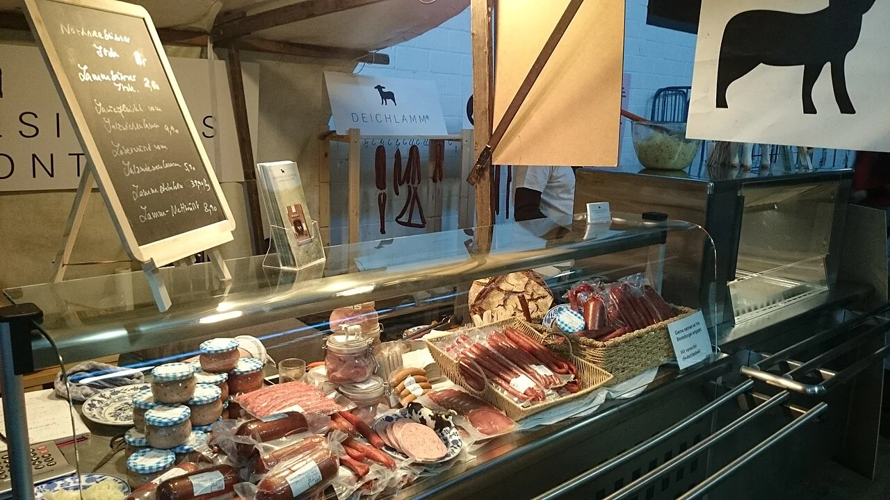 Food counter at Markthalle Neun in Berlin, 2015 archive; not current prices or event information