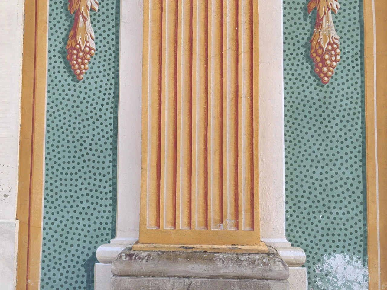Painted facade and column detail at Bruchsal Palace, December 2025