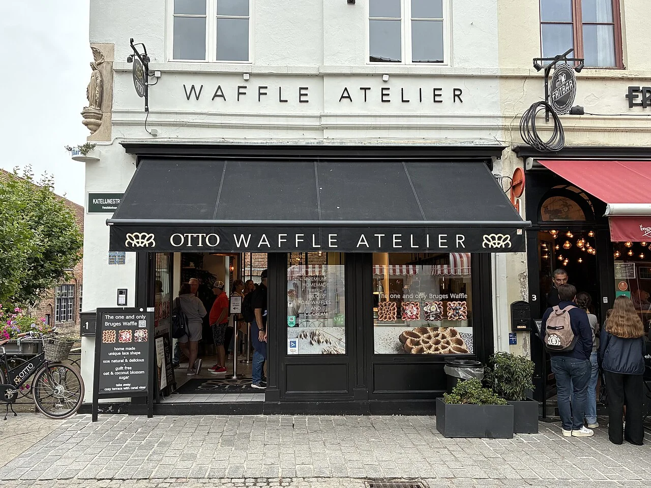 Front of Otto Waffle Atelier on Katelijnestraat, Bruges; archive photograph taken 31 August 2025.