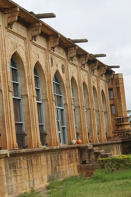 Arched exterior facade identified as Davangere in the source