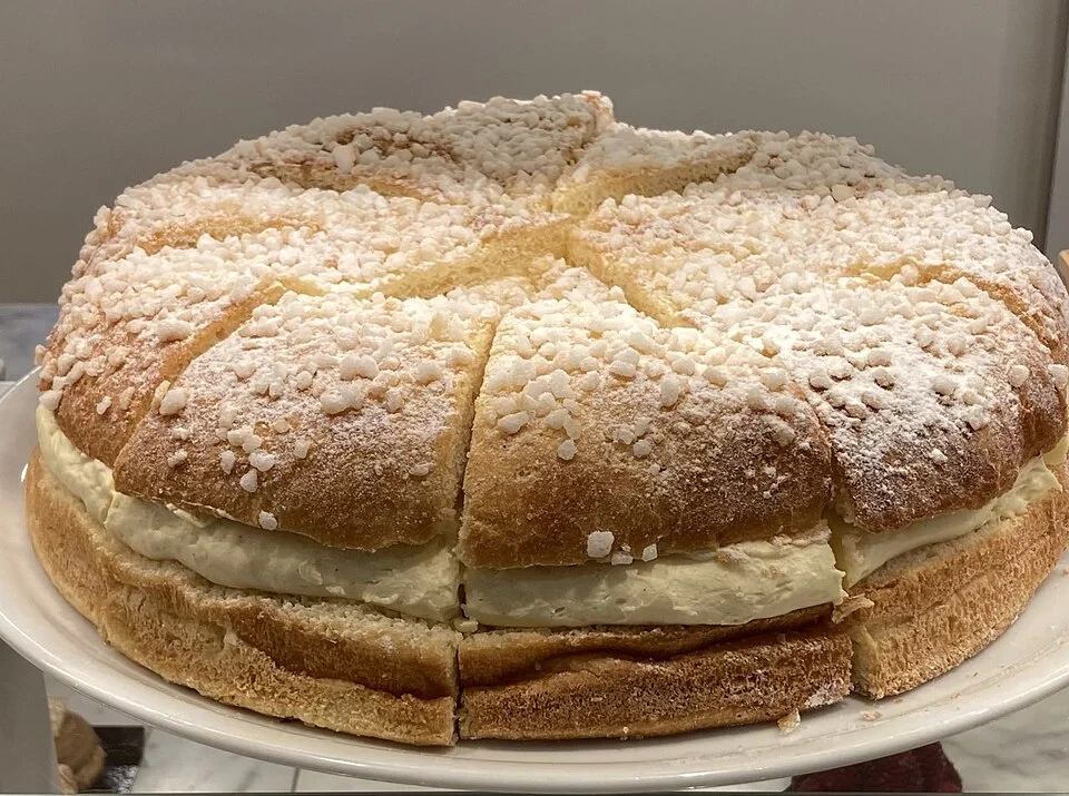 Cream-filled Tarte Tropézienne product example; February 2021, photographed at a Neuilly-sur-Seine pastry shop, not a Saint-Tropez business.