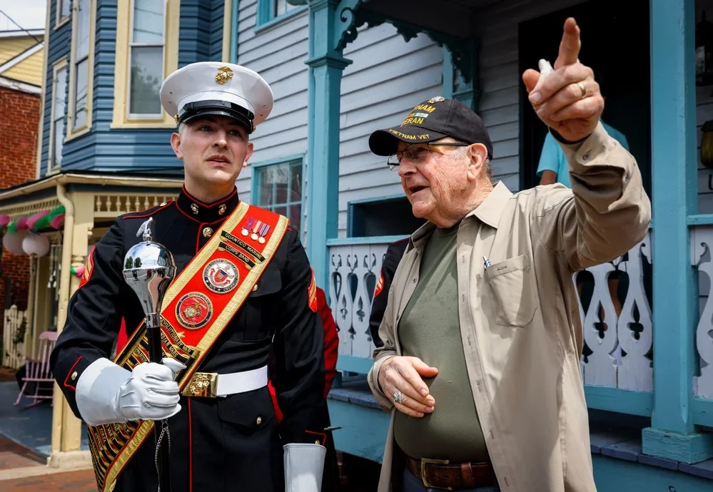 Band members and street facades at Winchester Apple Blossom parade, May 3, 2025 archive