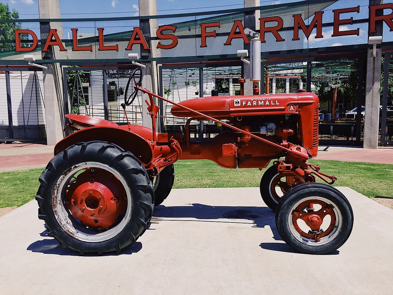 Tractor in front of the Dallas Farmers Market sign, 2016
