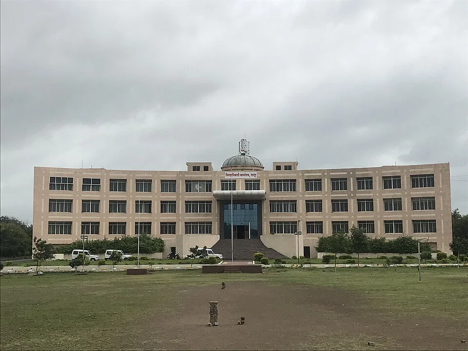 Facade and lawn setting of the New Collector Office building in Latur