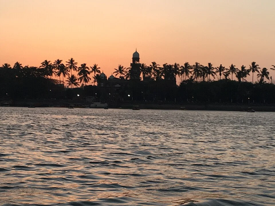 Rankala lake with the Shalini Palace silhouette on the opposite shore in Kolhapur