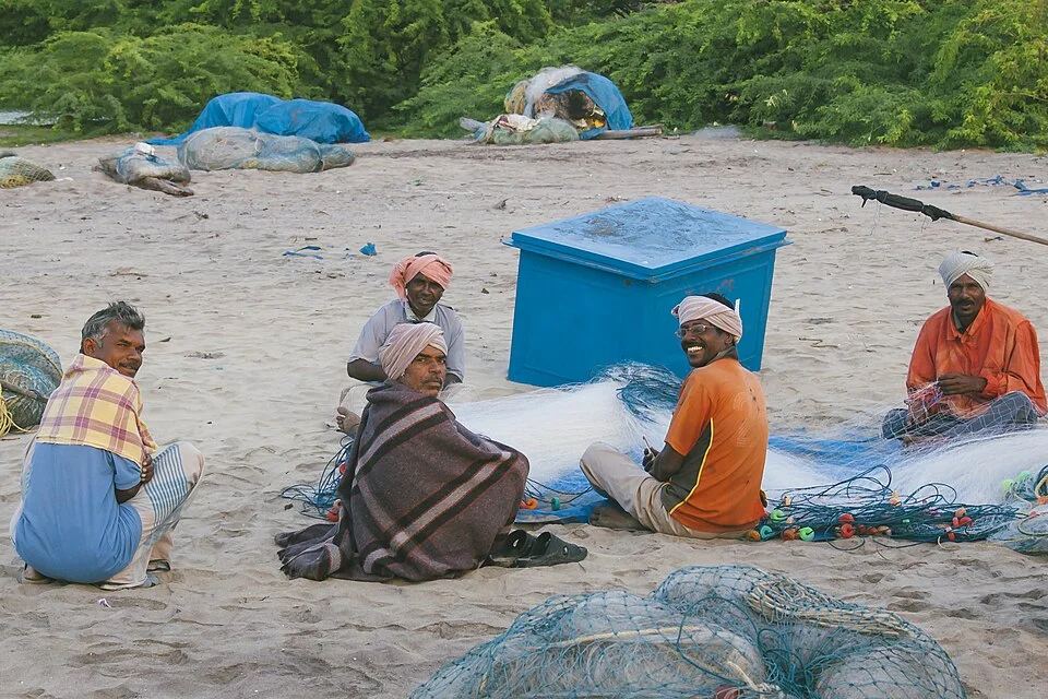 Fishermen preparing nets at Nagapattinam Beach