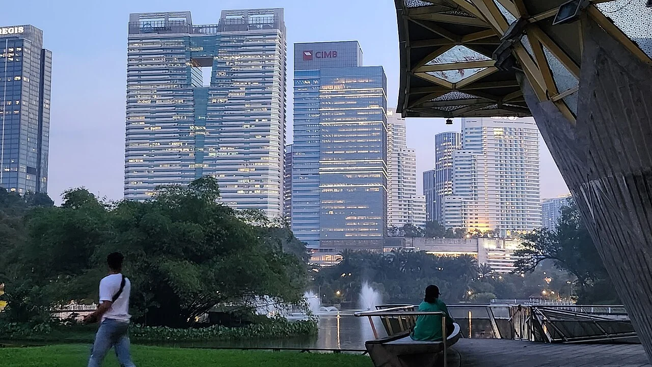 Perdana Botanical Gardens surroundings, Kuala Lumpur, 30 October 2023; authentic park scene with city backdrop.