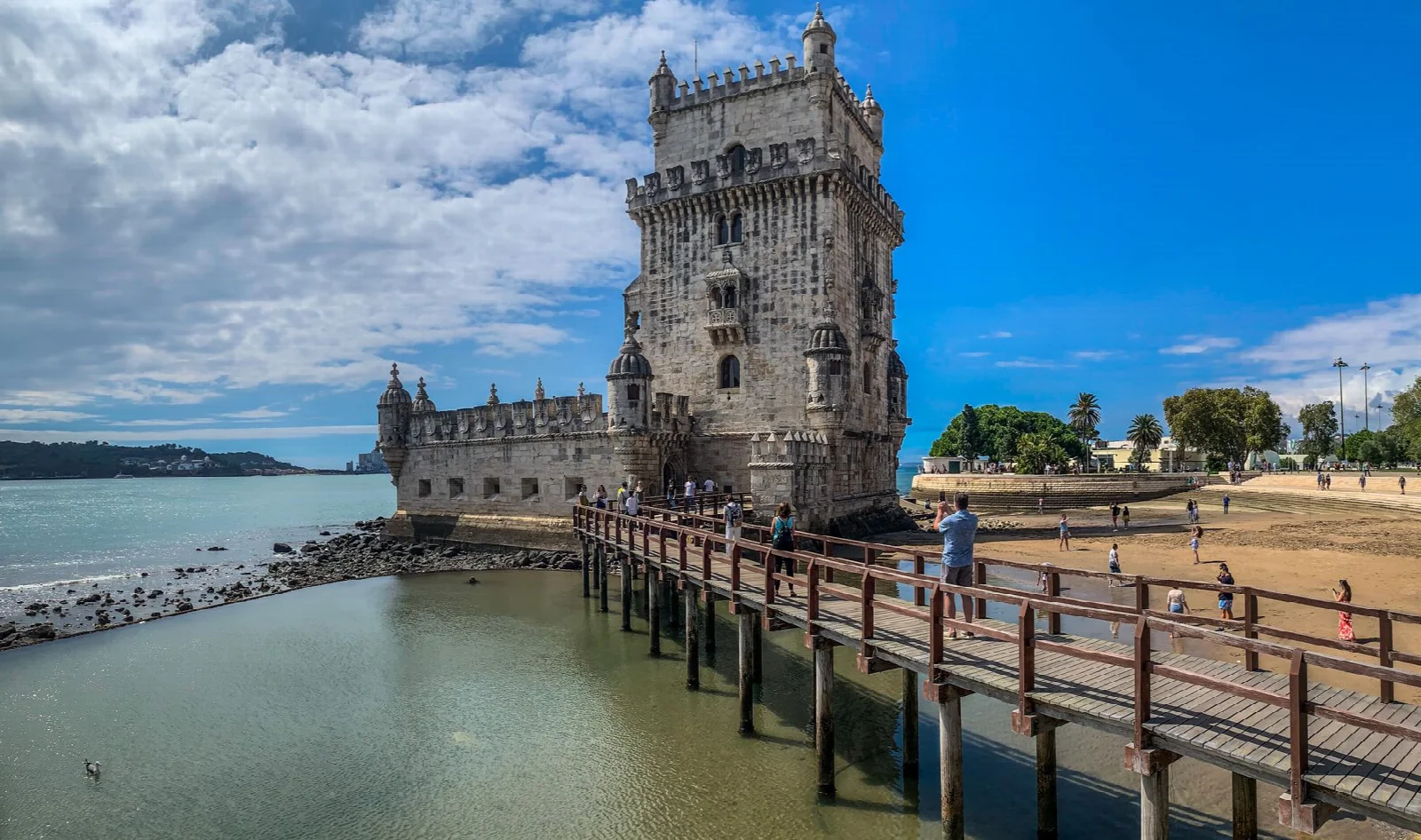 The stone facade of Belém Tower beside Lisbon’s Tagus River