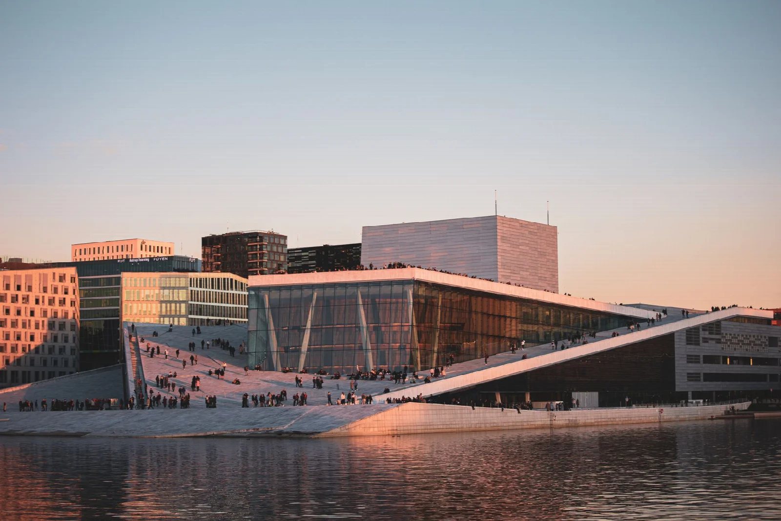 Oslo Opera House and architectural reflections in the waterfront