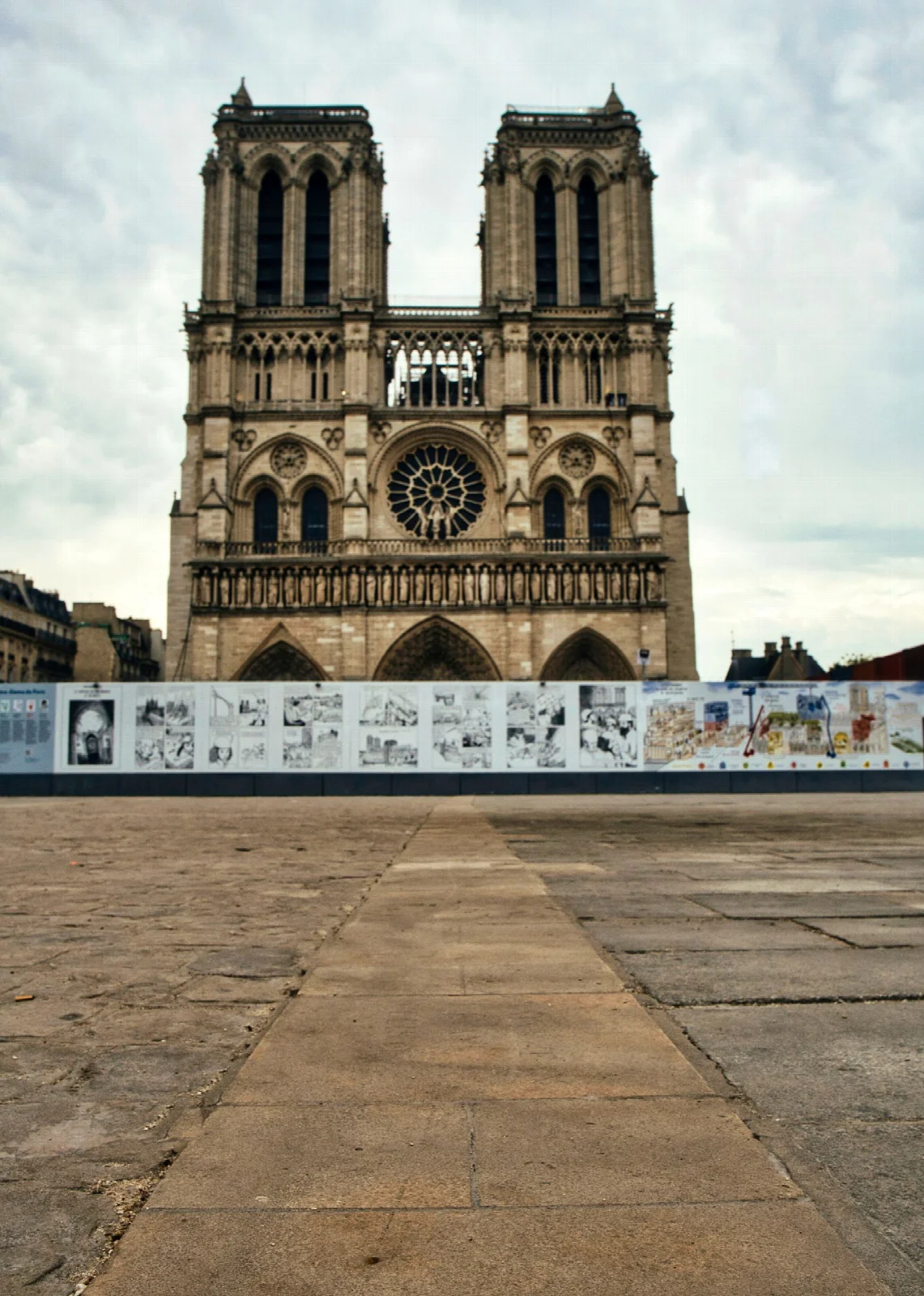 The twin towers and decorated main facade of Notre-Dame Cathedral in Paris