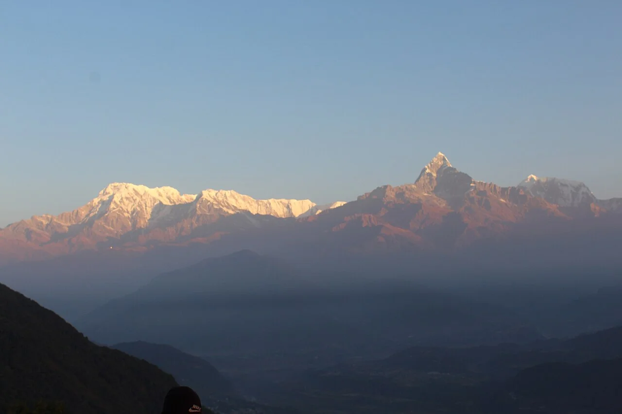 Annapurna mountain range from Sarangkot; Nabin845, 25 November 2018. Not a breakfast terrace or cafe view.
