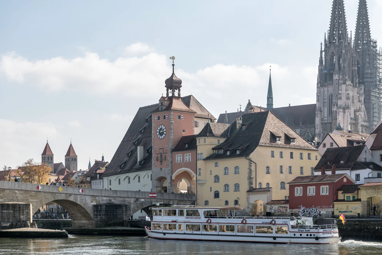 Regensburg old town and cathedral towers beside the Danube.