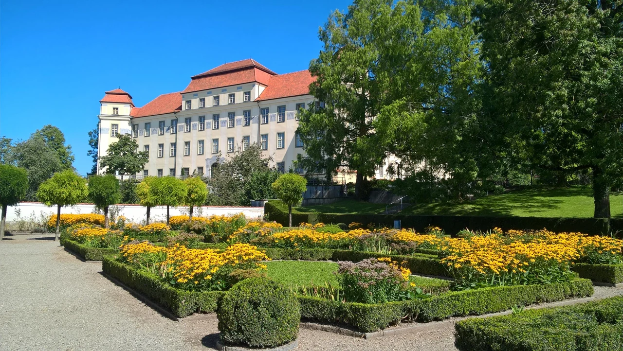 Flowers and palace frontage in the south garden of Tettnang Neues Schloss