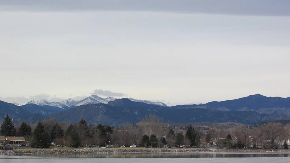 Lake Loveland water, shore and distant mountains, December 2013; not today’s shore access or snow conditions