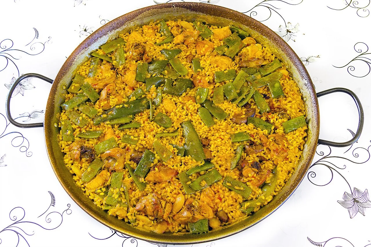 Valencian paella food illustration; shooting city and exact date unspecified