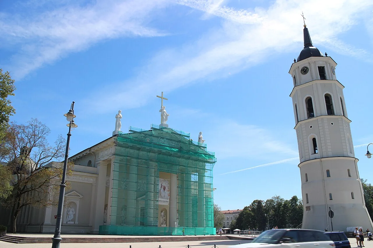 Vilnius Cathedral and separate bell tower; archive photograph taken 10 August 2018 includes façade restoration covering.
