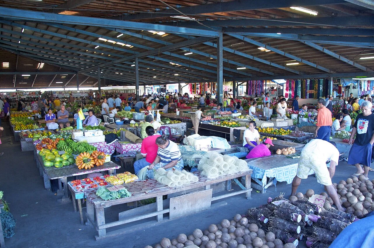Wide interior scene at Apia market, 2012; not evidence of current layout